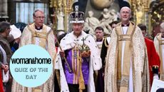 King Charles III wearing the Imperial state Crown carrying the Sovereign's Orb and Sceptre leaves Westminster Abbey after his coronation ceremony on May 6, 2023 