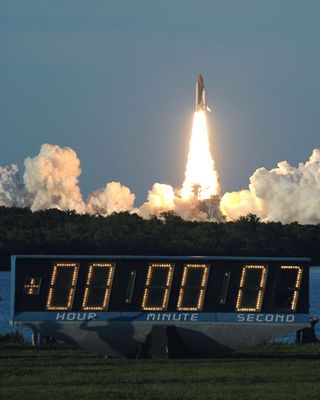 Liftoff! Shuttle Atlantis Rockets Towards Space Station