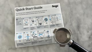 quick start guide and coffee filter on countertop