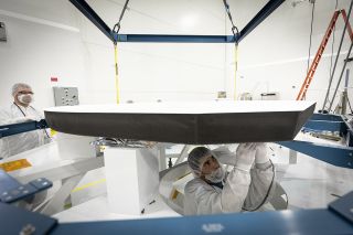 Parker Solar Probe's heat shield is made of two panels of superheated carbon-carbon composite sandwiching a lightweight 4.5-inch-thick carbon foam core. To reflect as much of the sun's energy away from the spacecraft as possible, the sun-facing side of the heat shield is also sprayed with a specially formulated white coating.
