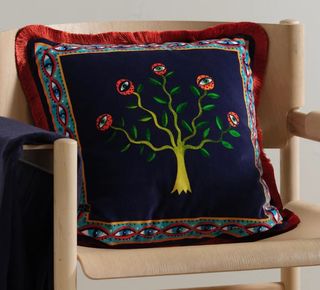 Pillow with tree of eyes