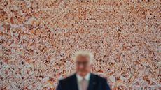 German President Frank-Walter Steinmeier speaks in front of the artwork "Hard String" by Monica Bonvicini during an exhibition preview at Bellevue Palace in Berlin, Germany