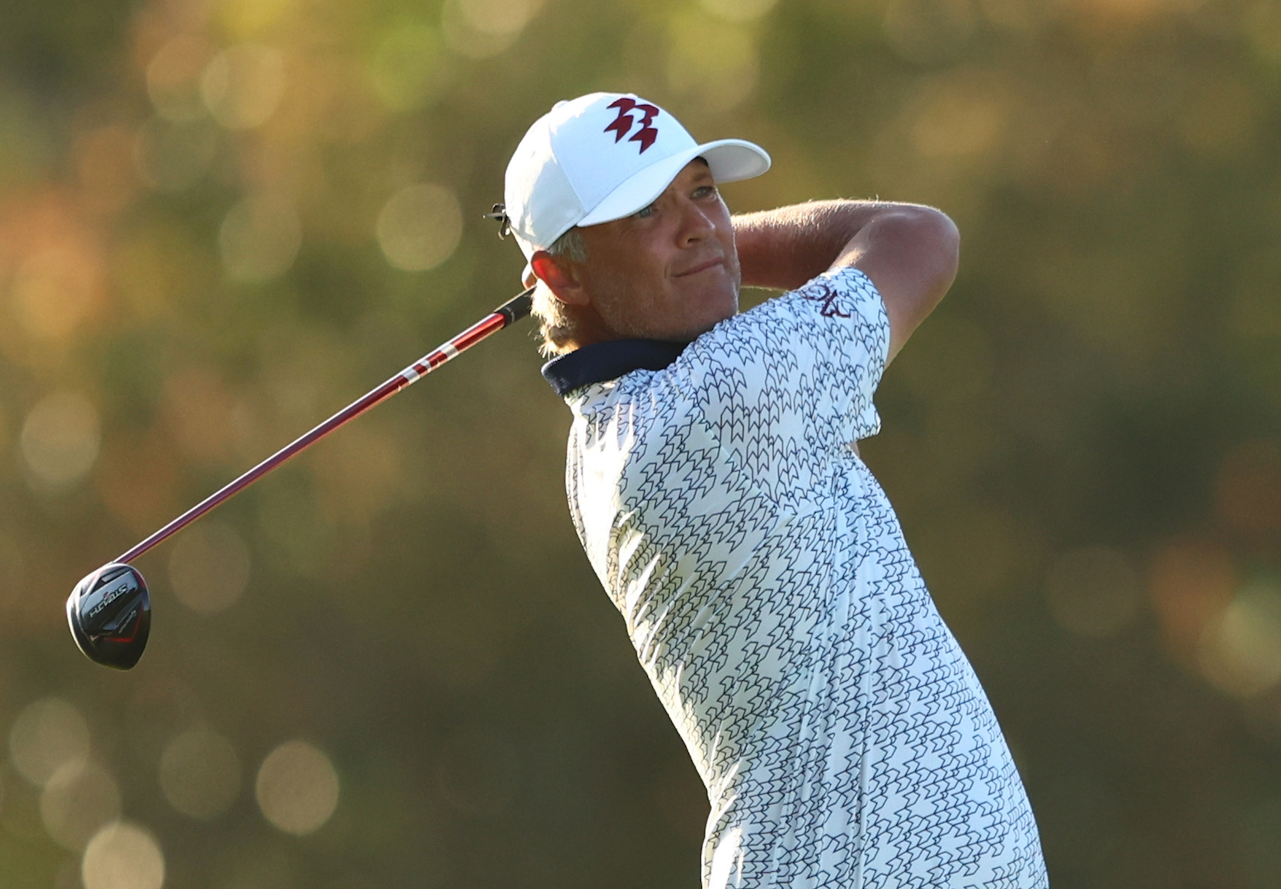 Matt Jones holds his finish on a fairway wood shot