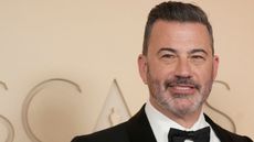 jimmy kimmel on a beige background