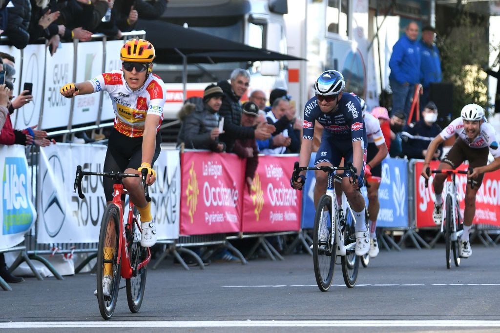 GARD FRANCE FEBRUARY 05 Tobias Halland Johannessen of Norway and UNO X Pro Cycling Team White Best Young Rider Jersey celebrates winning ahead of Jay Vine of Australia and Team AlpecinFenix during the 52nd toile De Bessges Tour Du Gard 2022 Stage 4 a 145km stage from Saint Hilaire de Brethmas to Mont Bouqueton 617m EDB2022 February 05 2022 in Gard France Photo by Luc ClaessenGetty Images