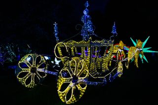 A fairy tale carriage done up in Christmas lights