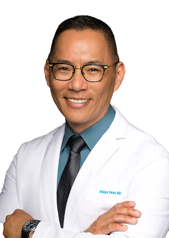 a man in a white lab coat, tie, and blue shirt with glasses