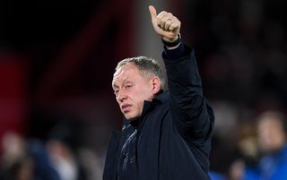 Steve Cooper salutes the Nottingham Forest supporters