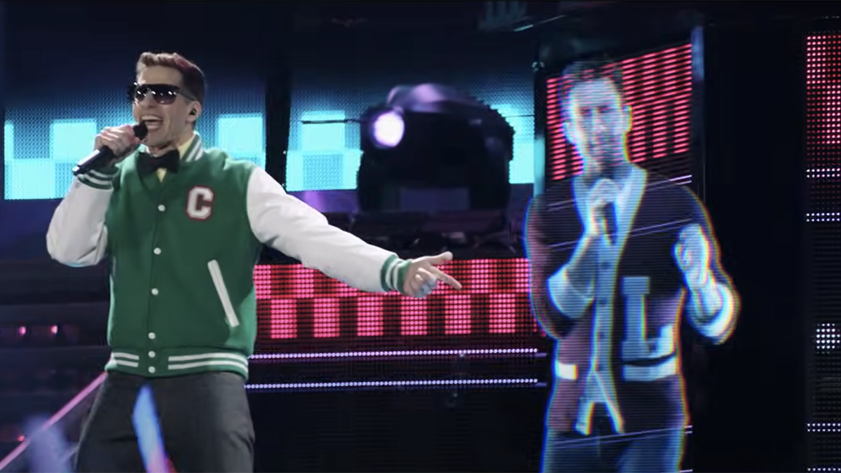 Andy Samberg and a hologram Adam Levine in Popstar: Never Stop Never Stopping