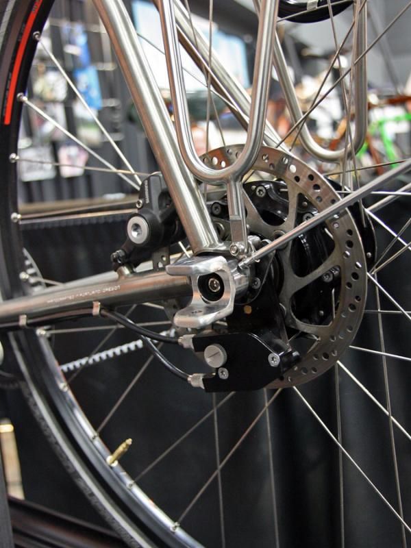 Vertigo Cycles' Sean Chaney discovered the stock bracket for his child trailer didn't fit on socketed dropouts - so he milled his own out of a block of aluminum.