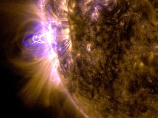 An X-class solar flare erupted on the left side of the sun on the evening of Feb. 24, 2014. This composite image, captured at 7:45 p.m. EST, shows the sun in ultraviolet light with wavelength of both 131 and 171 Angstroms.