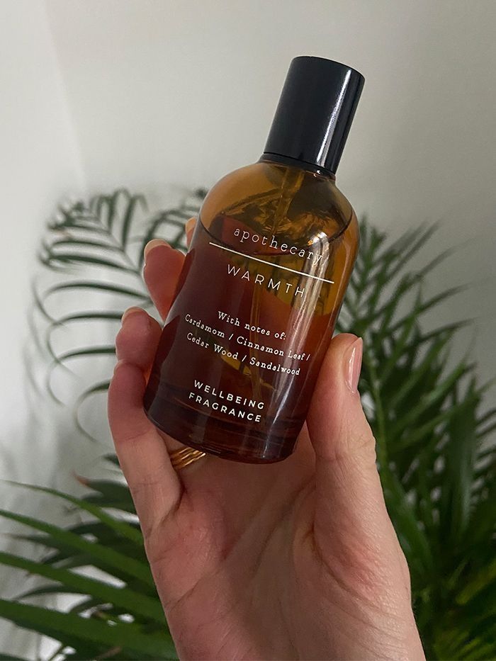 A bottle of M&S Apothecary Warmth perfume