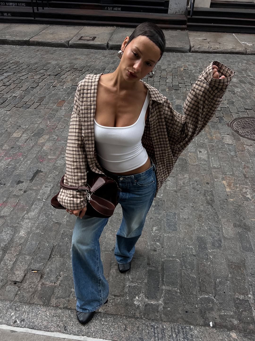 woman wearing chic fall 2025 denim trends