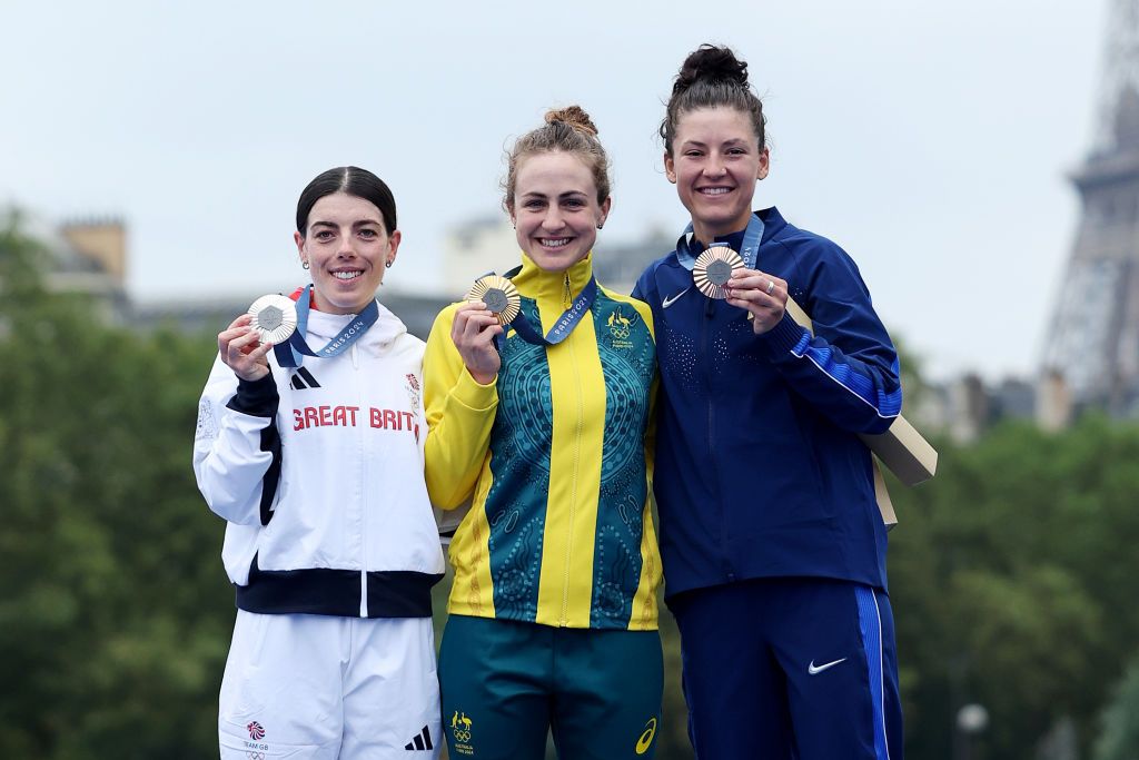 PARIS FRANCE JULY 27 Gold medalist Grace Brown of Team Australia C Silver medalist Anna Henderson of Team Great Britain L and Bronze medalist Chloe Dygert of Team United States R pose on the podium during the Womens Individual Time Trial on day one of the Olympic Games Paris 2024 at Pont Alexandre III on July 27 2024 in Paris France Photo by Tim de WaeleGetty Images