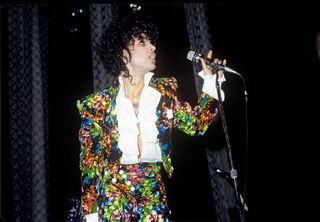 Prince performs at the Hollywood Palace to promote the opening of his film 'Purple Rain' on July 26, 1985 in Los Angeles, California