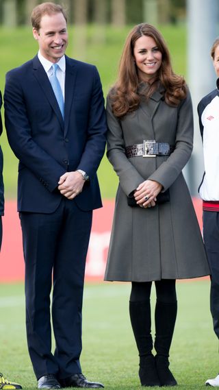 Prince William and Kate Middleton stand at the official launch of The Football Association's National Football Centre