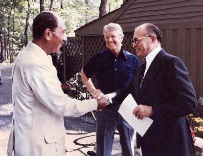 Anwar Sadat, Jimmy Carter, and Menachem Begin at Camp David in September 1978.