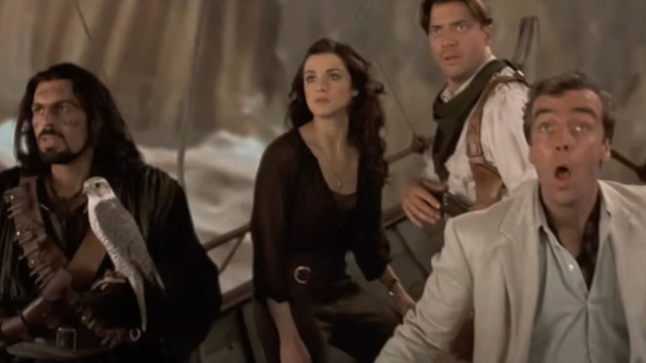 Oded Fehr Rachel Weisz Brendan Fraser and John Hannah sail in a dirigible with looks of horror in The Mummy Returns.