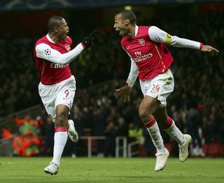 Julio Baptista of Arsenal celebrates with Thierry Henry of Arsenal (R) after Baptista scored during the UEFA Champions League Group G match between Arsenal and Hamburg SV at The Emirates Stadium on November 21, 2006 in London, England.