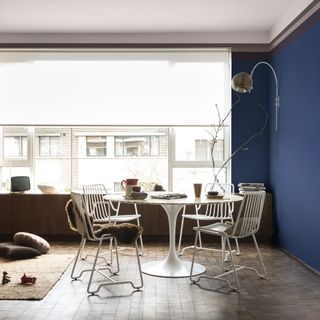 dining room with heather wood and blue walls