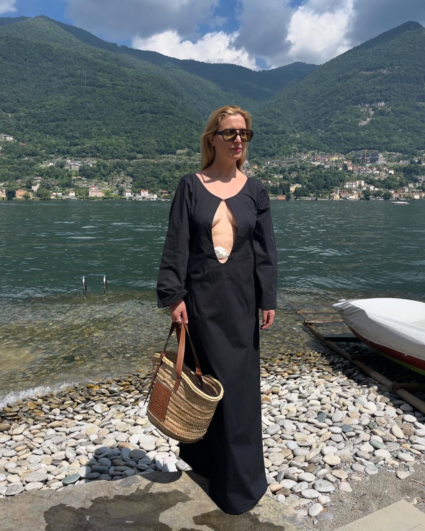 Kerry Pieri wears a black kaftan on holiday.