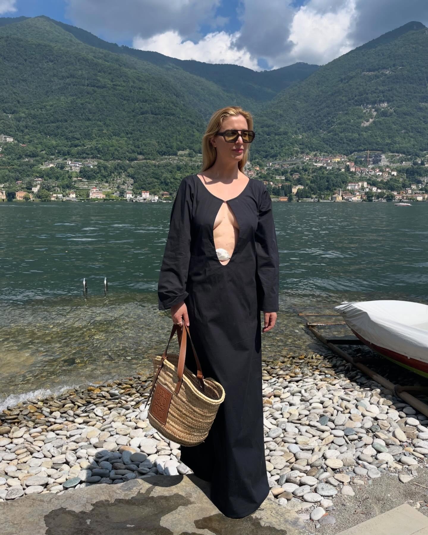 Kerry Pieri wears a black kaftan on holiday.