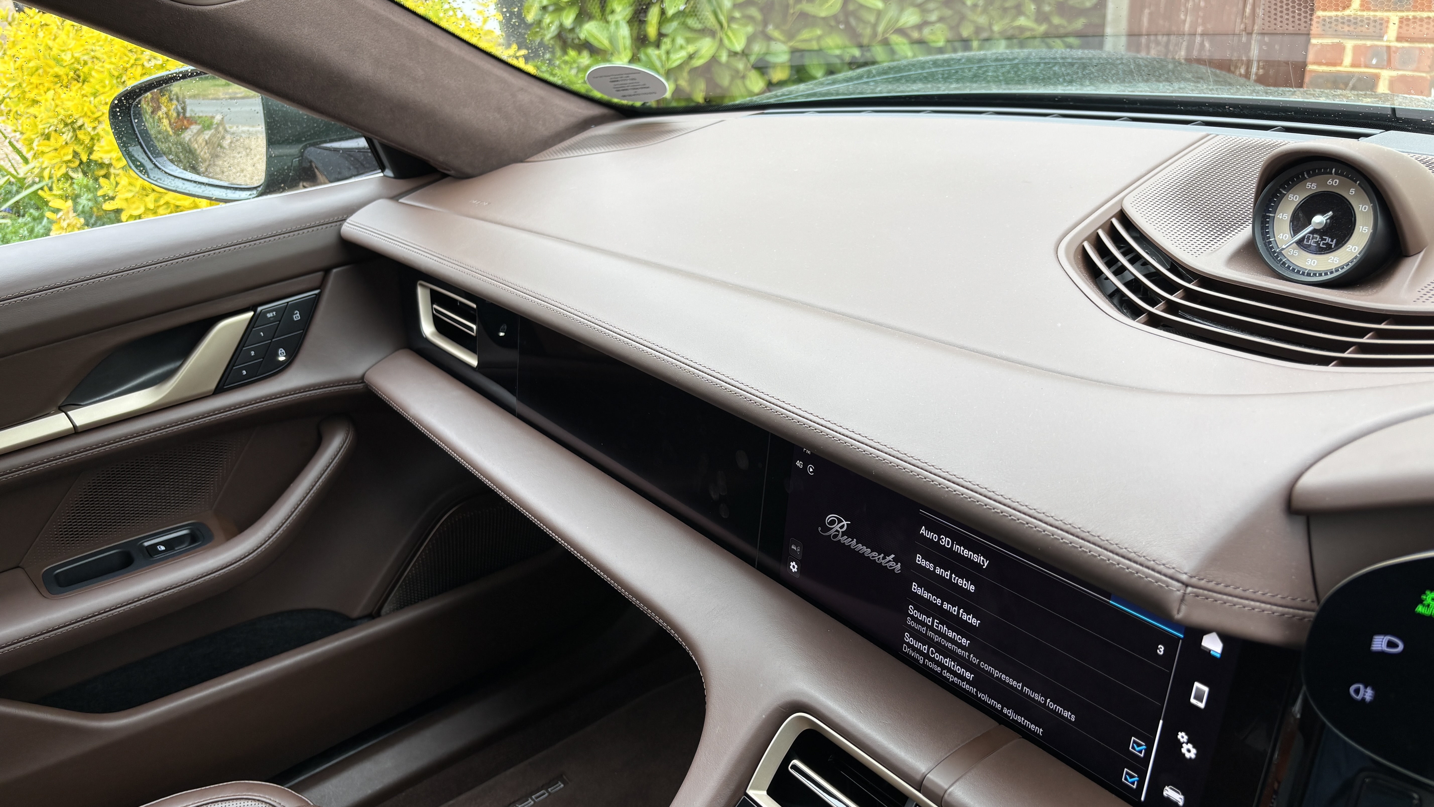 View of the front speaker layout in the cabin of a Porsche Taycan