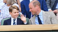 Prince George of Cambridge and Prince William, Duke of Cambridge attend The Wimbledon Men's Singles Final the All England Lawn Tennis and Croquet Club on July 10, 2022 in London, England. 