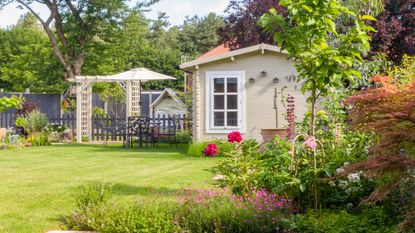 A bright green lawn in an English garden