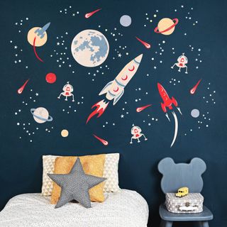 blue scheme kids bedroom with space themed wall from koko kids