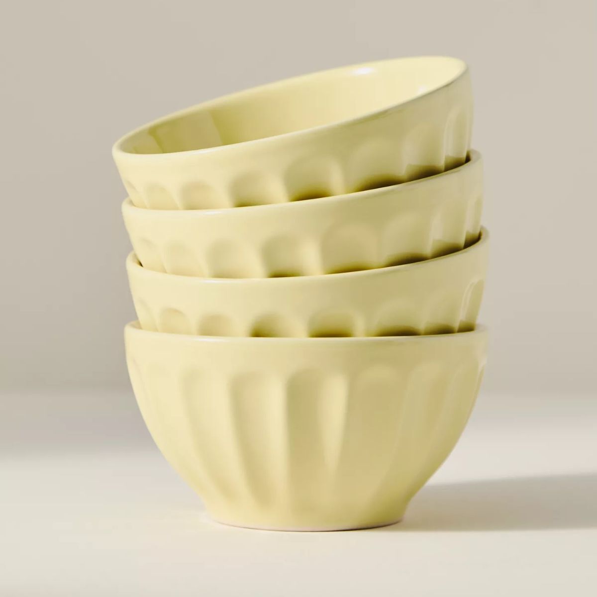 A stack of yellow bowls