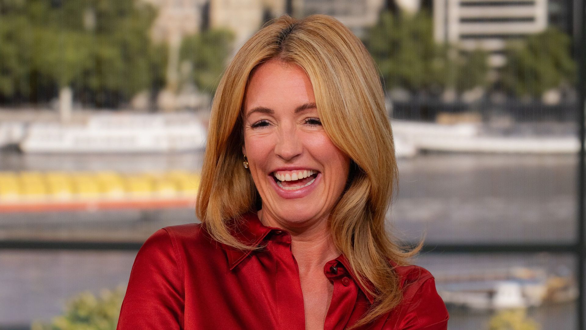 Cat Deeley’s silk shirt and slim-fit jeans create the chicest of smart casual outfit ideas that will work in warm but wet weather this summer