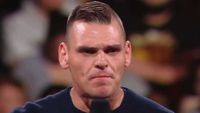 Gunther delivers an angry promo in the ring.