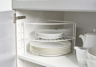 kitchen storage with saucer and plates