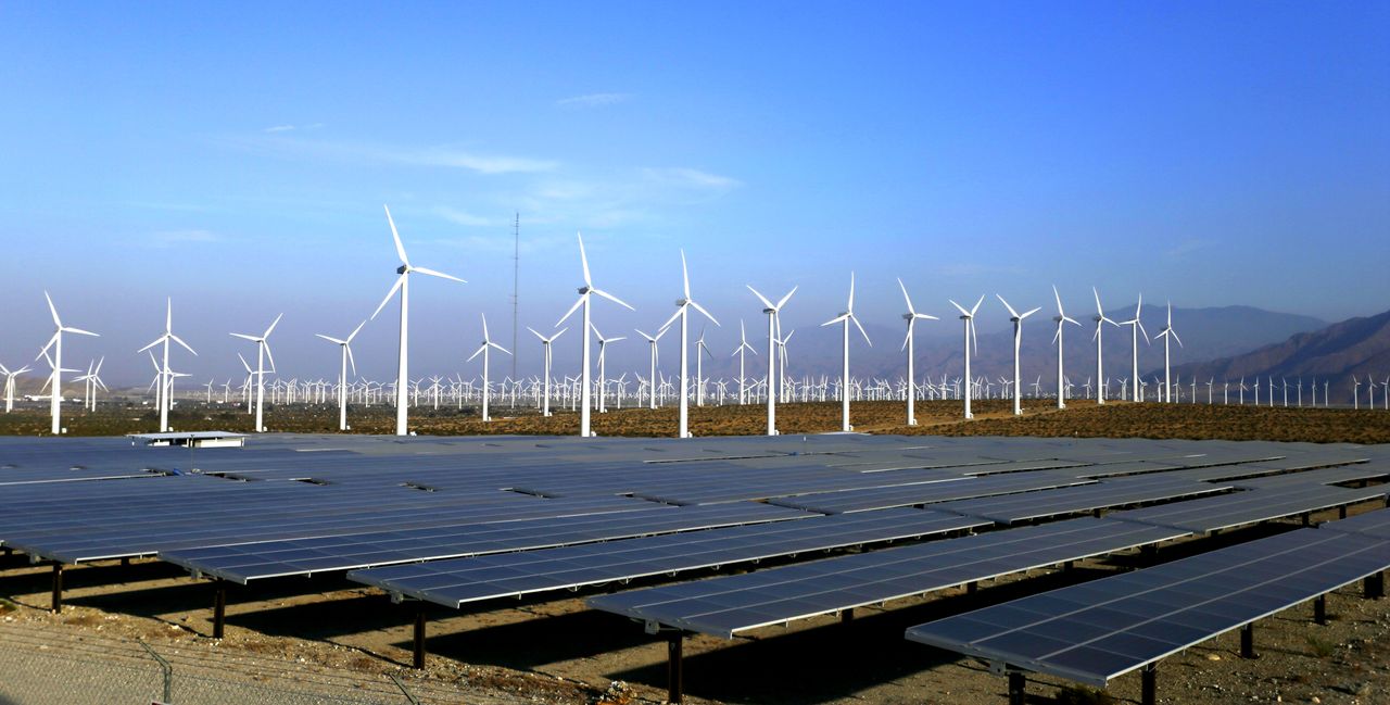 Wind turbines and solar panels.