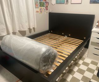 A WinkBed Luxury Hybrid Mattress on a bed.