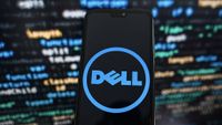 Dell logo on phone screen with code background
