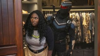 Leota Adebayo and Vigilante peering from behind a closet door in Peacemaker season 2 episode 6