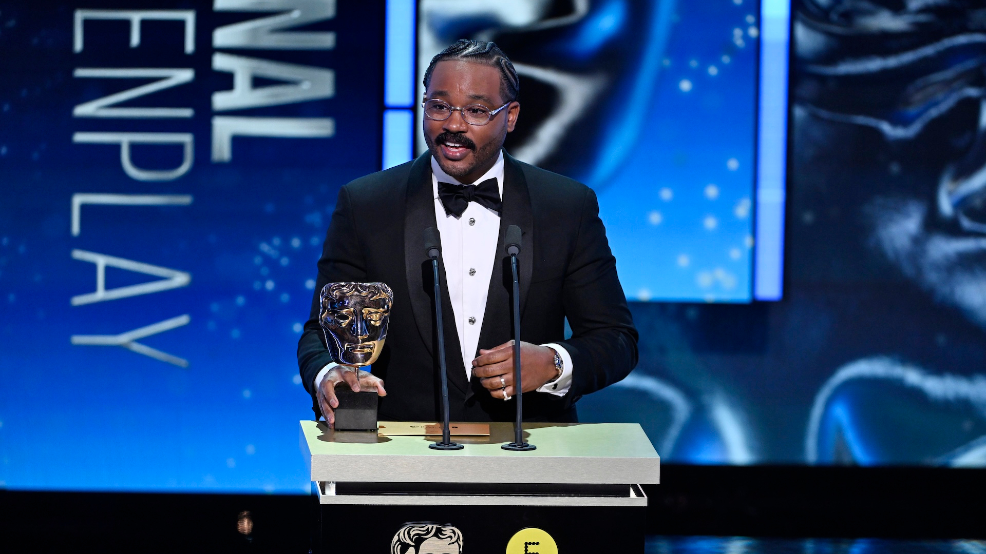 Ryan Coogler accepts the Original Screenplay Award for 'Sinners' on stage during the EE BAFTA Film Awards 2026 at The Royal Festival Hall on February 22, 2026 in London, England