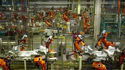 An automated production line at a BMW Mini factory in Oxford