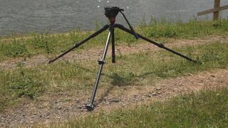 The tripod deployed in a low shooting position