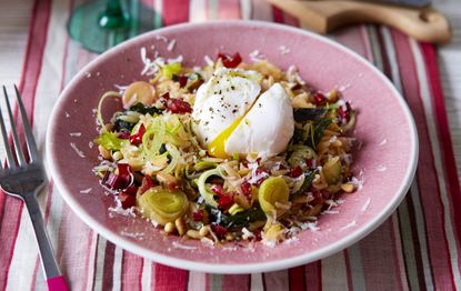 Vegetable orzo rice with a poached egg