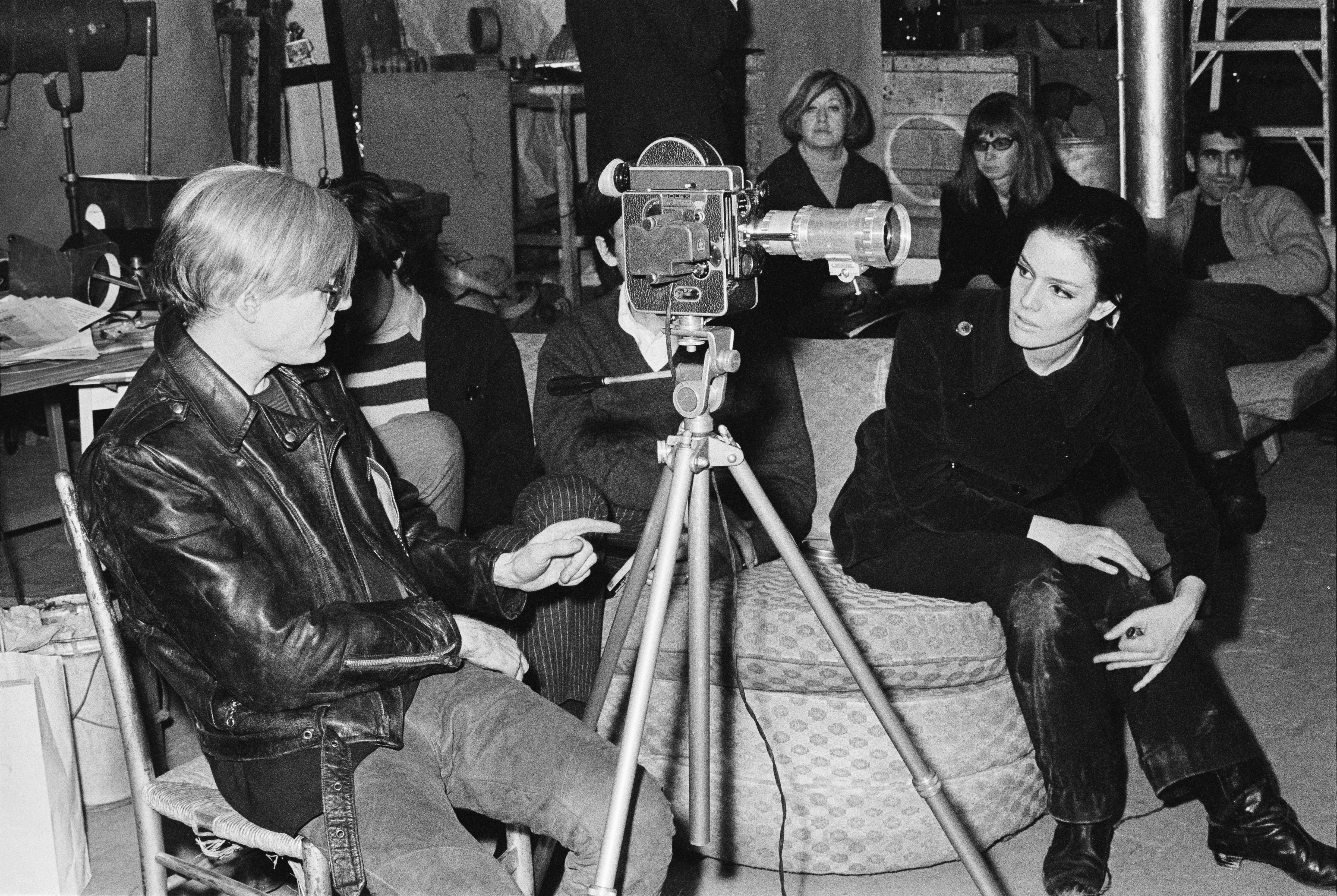 Andy Warhol filming at the Factory with Susan Bottomly