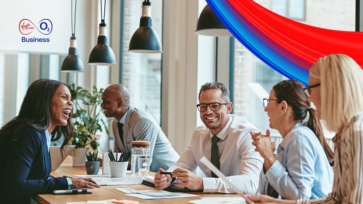 Colleagues meeting around a table