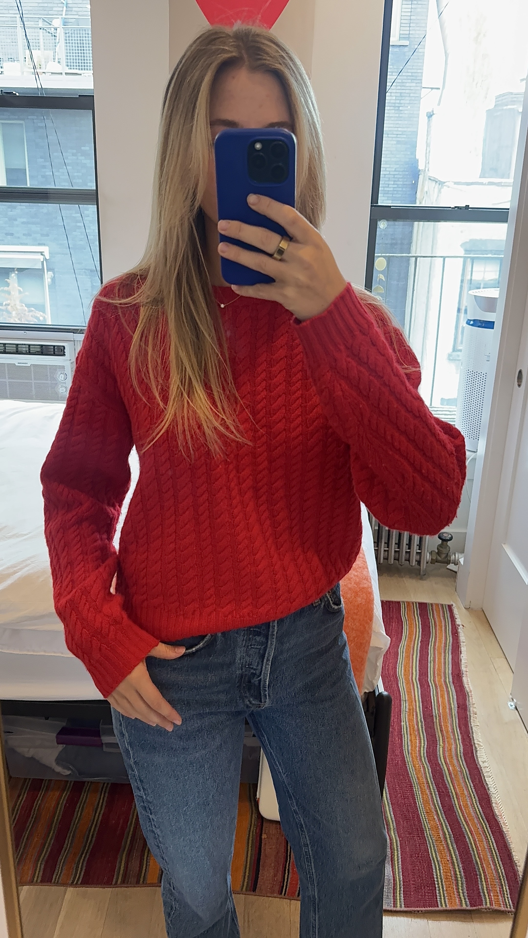 Bailey Burke in a cashmere sweater.