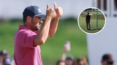 Scottie Scheffler puts two thumbs up during singles Sunday at the Presidents Cup