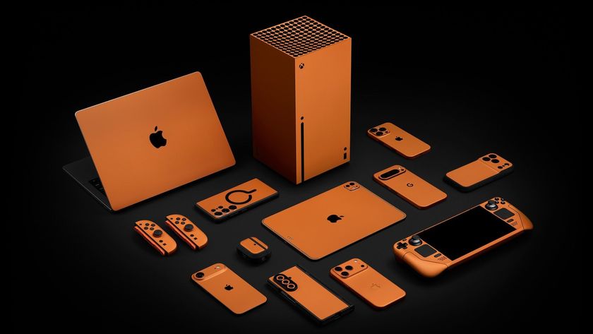 Cosmic Orange skin from dbrand being installed on various devices like phones, tablets and laptops