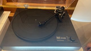 Dual CS 618Q turntable in black finish on stand