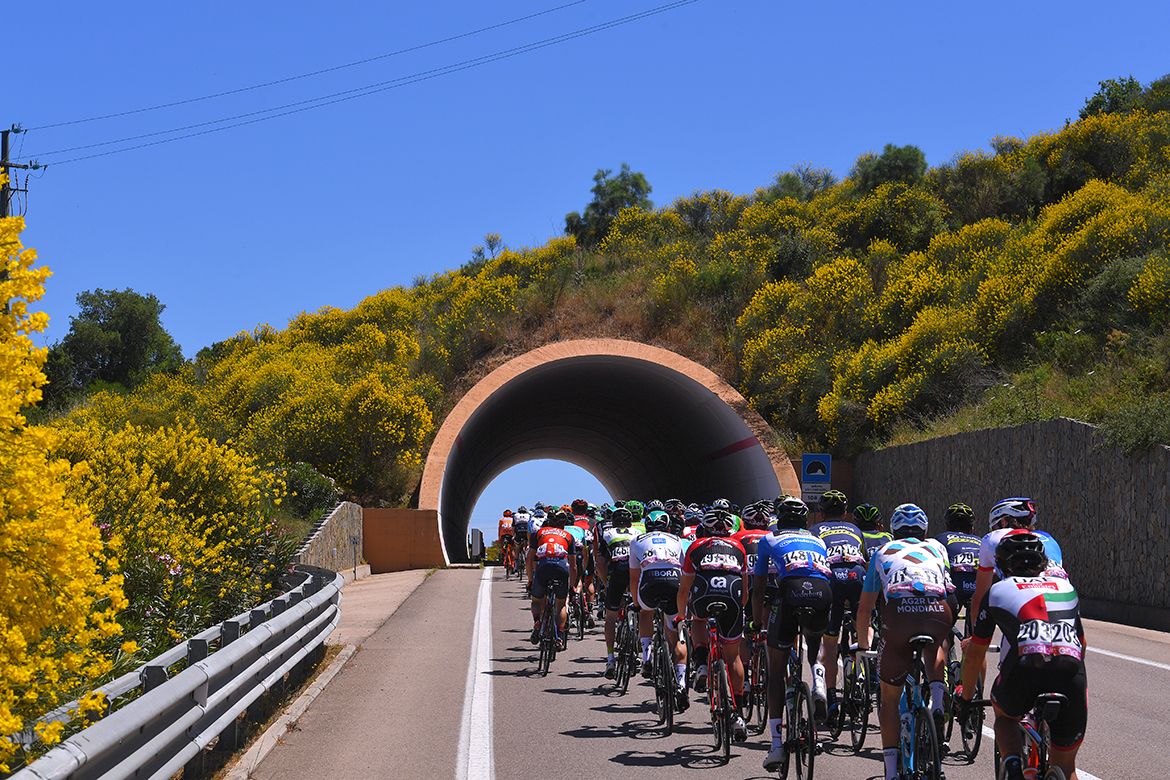 The pack rides through a tunnel at the Giro d'Italia.