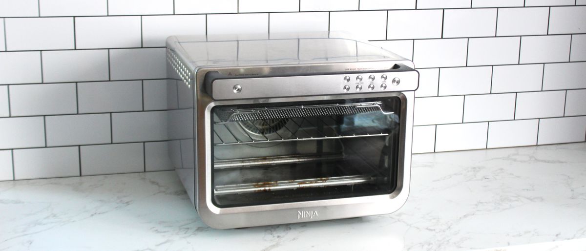 Ninja Prestige Smart XL Air Fryer &amp; Countertop Oven being tested in a white kitchen